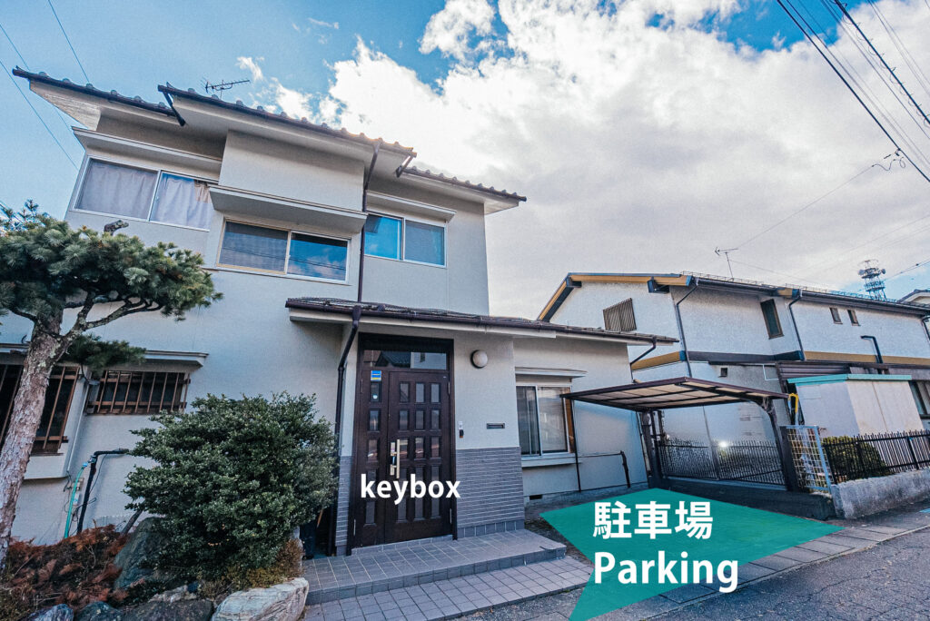 Guesthouse exterior with parking